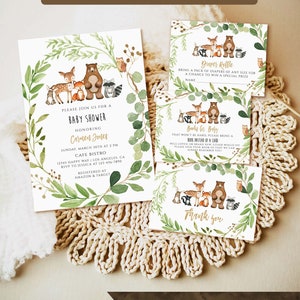 May include: A woodland-themed baby shower invitation with a green leafy border and watercolor illustrations of animals, including a bear, deer, fox, and raccoon. The invitation includes the text "Please join us for a Baby Shower honoring Carmen Jones" and details about the event, including the date, time, location, and RSVP information. The invitation also includes the text "Registered at Amazon & Target".