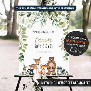 May include: Welcome sign for a baby shower with a woodland theme. The sign features a leafy green border with watercolor leaves and a white background. The text reads "Welcome to Carmen's Baby Shower" with the date "October 21st, 20XX". The sign also features a group of woodland animals including a deer, fox, bear, rabbit, and raccoon.