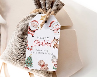 May include: A Christmas gift tag with a burlap bag. The tag features watercolor illustrations of Santa Claus, a snowman, a reindeer, a gingerbread man, and an elderly woman. The tag reads "MERRY CHRISTMAS" in red script, with the family name below.