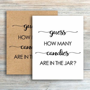 May include: White card with black text that reads "guess how many candies are in the jar?"