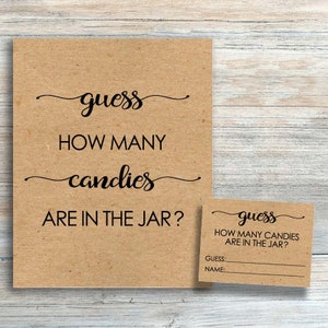 May include: A brown card with the text "guess how many candies are in the jar?" and a smaller white card with the text "guess how many candies are in the jar?" with lines for "guess" and "name".