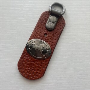 Trotting horse leather key ring made using reclaimed leather from rescued leather belt scraps