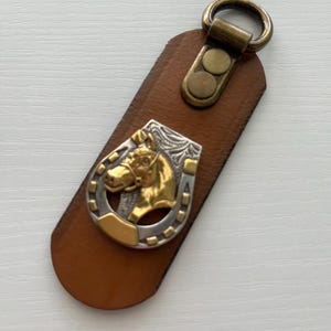 Horse and horseshoe leather key ring made using reclaimed leather from rescued leather belt scraps