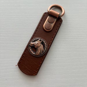 Horse head leather key ring made using reclaimed leather from rescued leather belt scraps