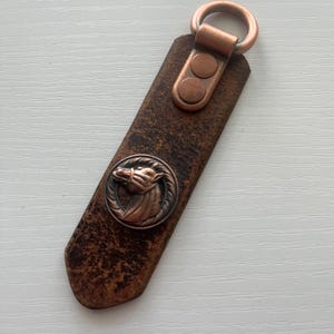 Horse head leather key ring made using reclaimed leather from rescued leather belt scraps
