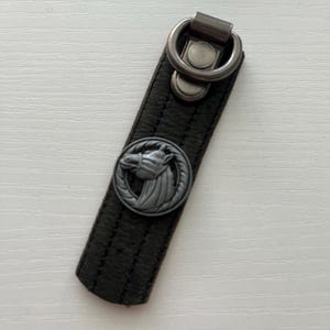 Horse head leather key ring made using reclaimed leather from rescued leather belt scraps