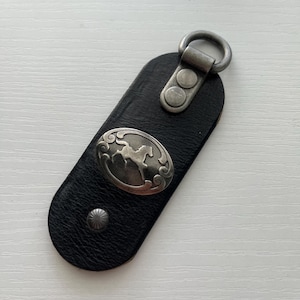 Trotting horse leather key ring made using reclaimed leather from rescued leather belt scraps