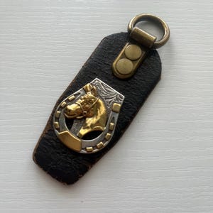 Horse and horseshoe leather key ring made using reclaimed leather from rescued leather belt scraps