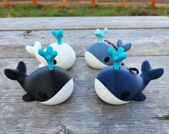 Clicker de ballena: Juguete antiestrés impreso en 3D con temática oceánica, ideal para escritorio y llavero opcional.
