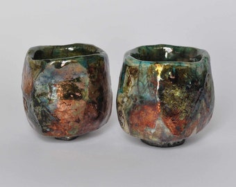 Set of two shiny "stones". Copper luster and crackle effects. Raku pottery. Wabi-sabi