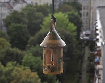 Raku pottery bird feeder for small birds with gothic windows.  Beige-yellow with green. Hanging bird feeder.