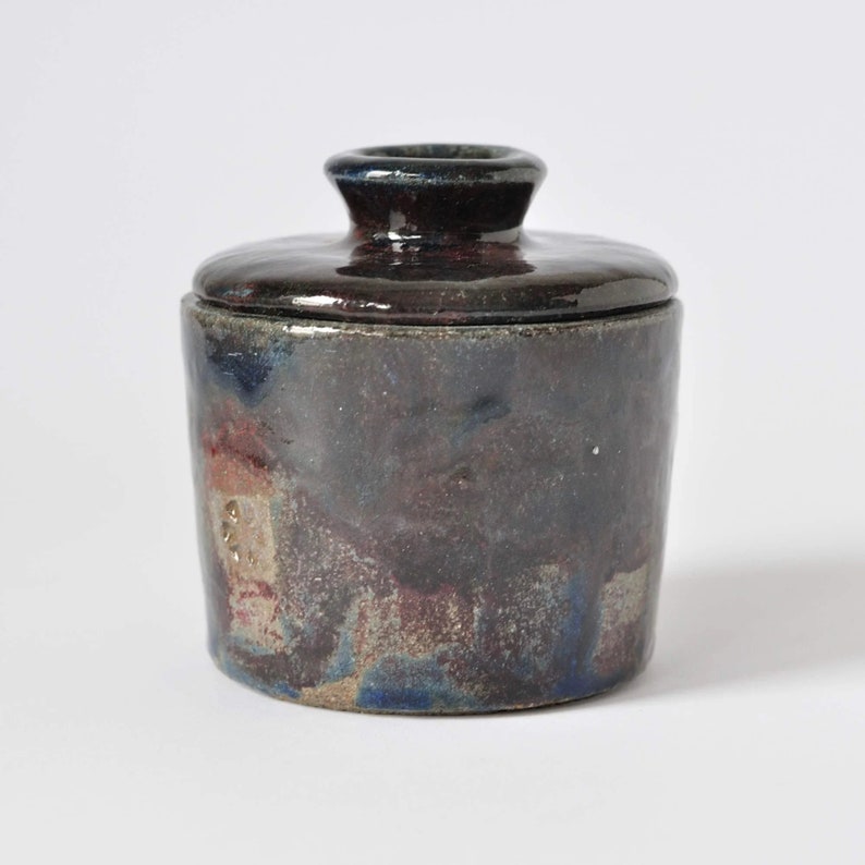 Raku pottery container with a lid. image 2