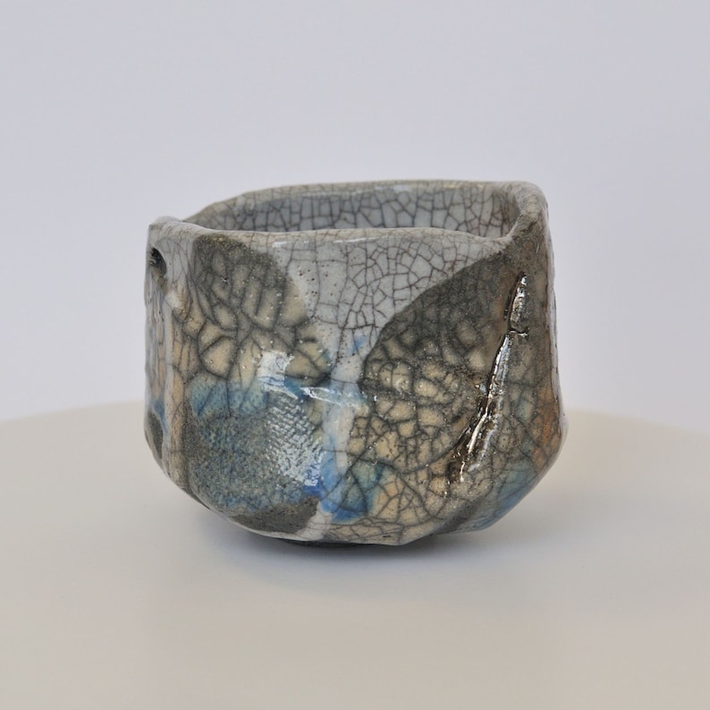Big Asymmetric Whitegray Chawan With Azure and Light Orange Smears. A