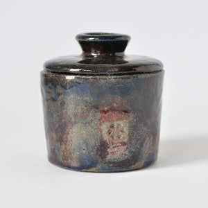 Raku pottery container with a lid. image 3