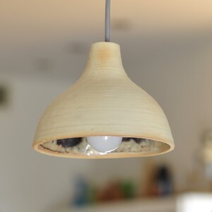 Raku pottery, ceramic dome-shaped pendant lamp. Beige, brown, with a little bit of salmon pink glaze inside.