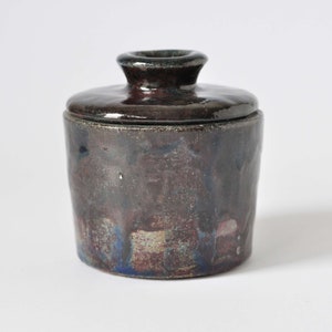 Raku pottery container with a lid. image 4