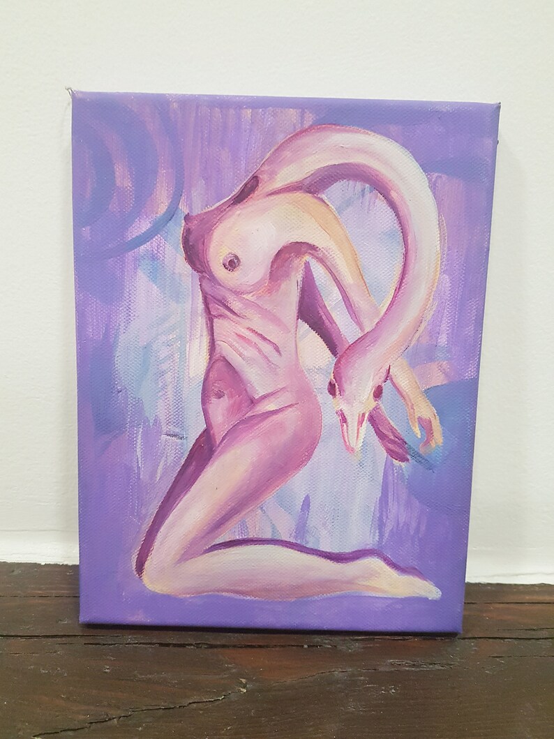 May include: An original painting on canvas depicts a nude figure with a swan-like form. The artwork features a palette of pinks and purples, with the figure's body blending into a soft, abstract background. The painting is mounted on a wooden frame.