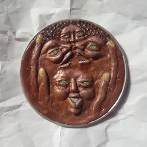 Emotions in the hands ,unique and original bas-relief made of modeling clay