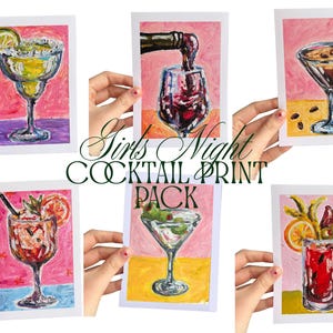 May include: A pack of six cocktail prints, each featuring a different drink illustration. The prints are held by hands against a pink background. The text "Girls Night COCKTAIL PRINT PACK" is in the center.