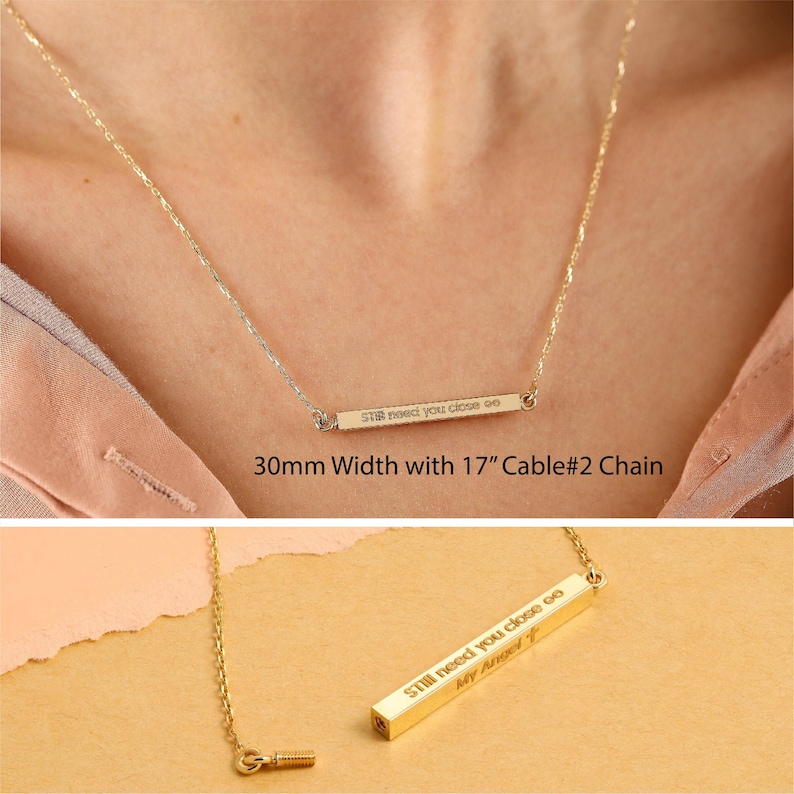May include: Gold bar necklace with the inscription "Still need you close to" and "My Angel T". The necklace is 17 inches long and has a cable chain.
