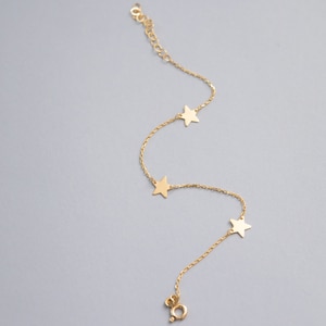 Armband i 14K guld med stjärna, elegant himmelsk design