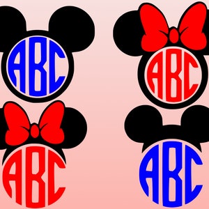 Puede incluir: Dos juegos de orejas de Mickey Mouse negras con un lazo rojo y un círculo con las letras ABC en el centro. Un círculo tiene letras azules y el otro tiene letras rojas.