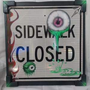 hand painted road sign
