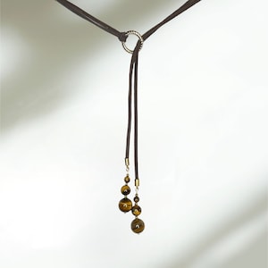 Collier Lariat oeil de chat marron en cuir/daim. image 1