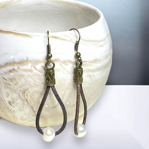 Leather and Pearl Dangle earrings.