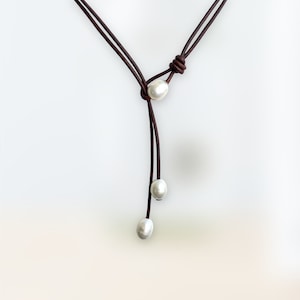 Leather and Pearl lariat Necklace with 3 large freshwater pearls .