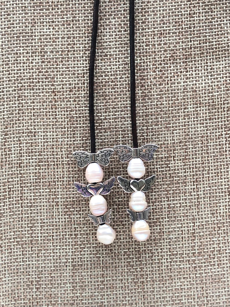 Leather and Freshwater Pearl Choker Y necklace.