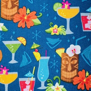 May include: A vibrant blue fabric pattern featuring tropical cocktails, tiki masks, and hibiscus flowers. The design includes various cocktail glasses with colorful drinks, umbrellas, and fruit garnishes. The tiki masks are brown, and the flowers are orange and pink.