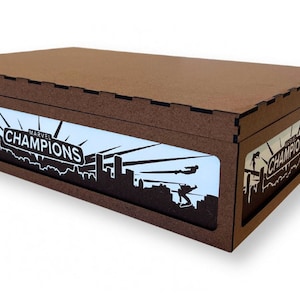 May include: A brown wooden box with a cutout design featuring a cityscape and the text "MARVEL CHAMPIONS".