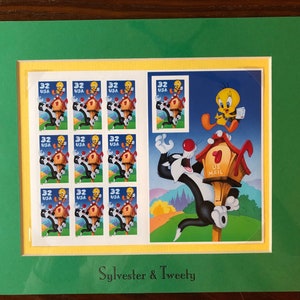 Loony Tunes Sylvester And Tweety Stamps Surrounded By A Green Matboard