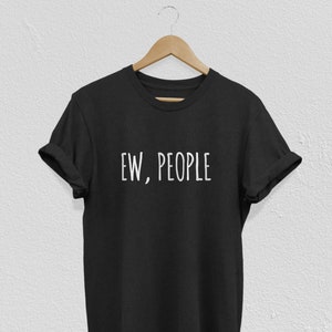 May include: Black t-shirt with white text that reads "EW, PEOPLE".