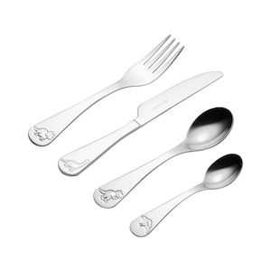 May include: A four-piece stainless steel cutlery set. The set includes a fork, knife, and two spoons. Each piece has a dinosaur design at the base of the handle. The utensils are arranged on a white background.