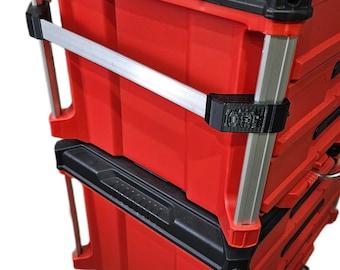 May include: A red and black tool chest with a silver handle and aluminum frame. The chest has multiple drawers and is stacked on top of another similar chest.