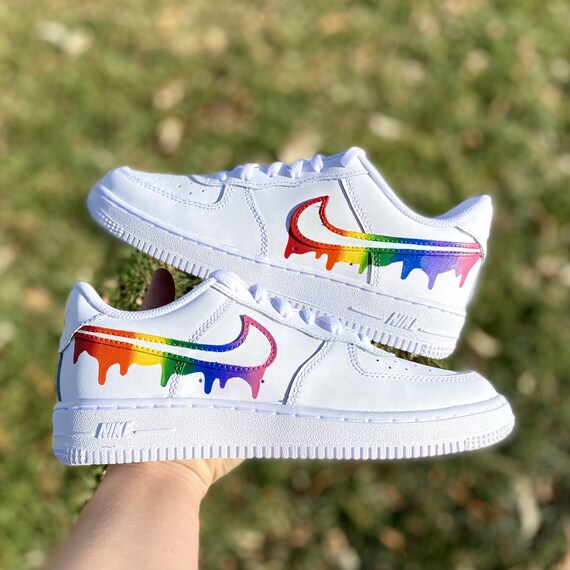white nike with rainbow swoosh