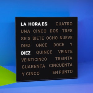 Spanish Language Word Clock - LED Text Display - Dual-Voltage US Plug (110-240V) - A Unique Gift Item - 28cm X 28cm X 3cm (11" X 11" X 1.1")