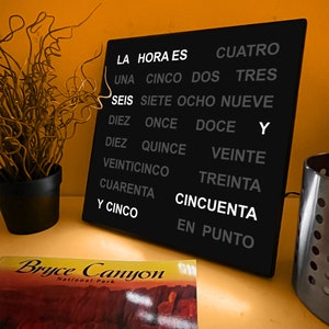 Spanish Language Word Clock - LED Text Display - Dual-Voltage Plug (110-240V) - A Unique Gift Item - 28cm X 28cm X 3cm (11" X 11" X 1.1")