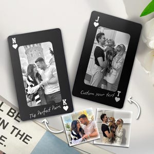 May include: Black playing cards with custom photos, featuring a couple and a couple with a dog. The cards have white suit symbols and the text "The Perfect Pairs" and "Custom your text". The cards are a unique personalized gift.