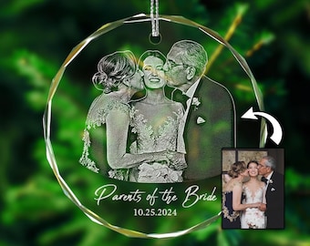 May include: A crystal ornament with a photo of a bride and her parents. The ornament is engraved with the text "Parents of the Bride" and the date "10.25.2024".