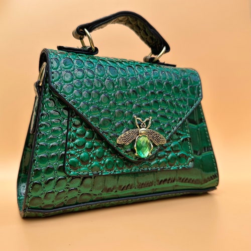 Emerald green handbags for women. Crossbody bag. evening bag. Small handbags. Grab bags. Purse bags. Top handle bag. Handbag with strap