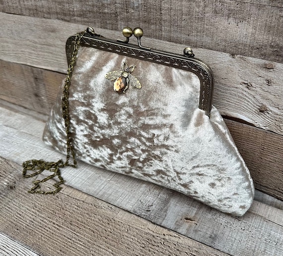 Champagne clutch purse deals