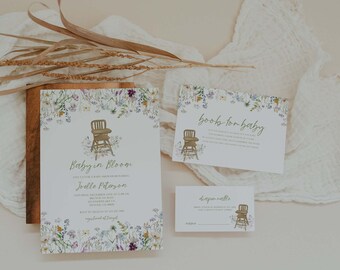 May include: Baby shower invitation with a floral design and a high chair. The invitation says "Baby in Bloom" and includes the name "Joddie Peterson".