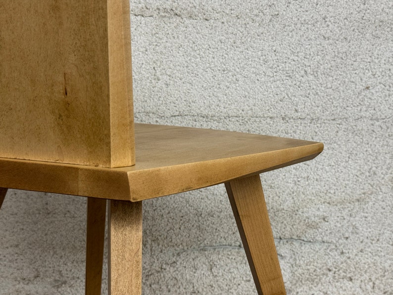 Sculptural solid wood slab chair, composed of three slabs of solid wood, 4 legs, and a satin brass connector