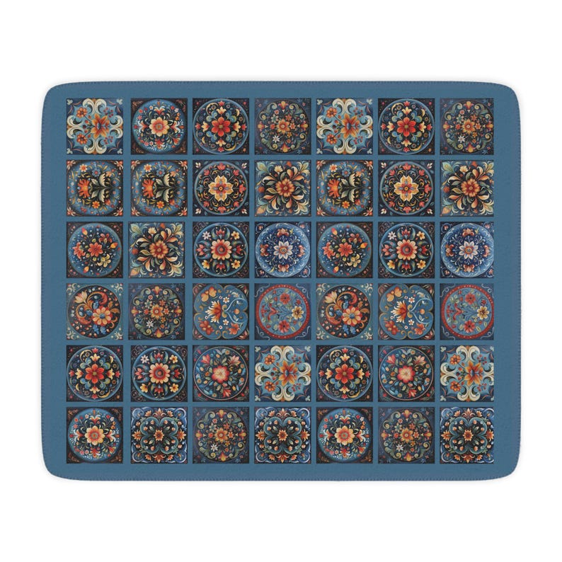 May include: A blue and black patterned square rug with a repeating design of floral motifs. The rug is made up of 49 individual squares, each with a different floral design.