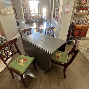 Duncan Phyfe vintage drop leaf table, sage needlepointe flower chairs, 1950’s furniture