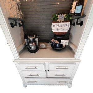 Distressed white coffee and wine armoire, grey pipe shelves, graystone beadboard, beverage bar, beverage station, wine bar, rustic farmhouse