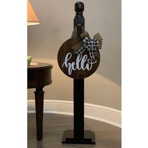 Banister post & welcome sign, wood post